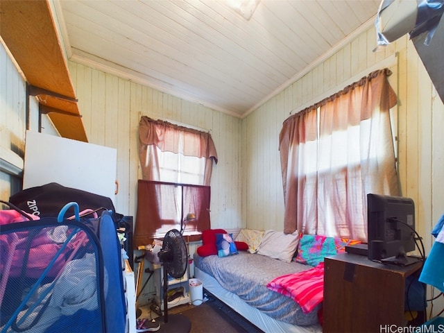 bedroom with crown molding