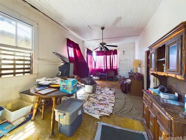 interior space featuring wooden ceiling and ceiling fan