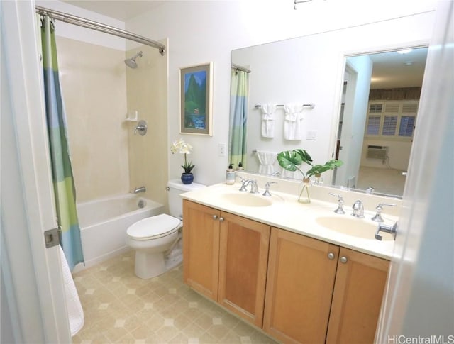 full bathroom with vanity, toilet, and shower / bath combo with shower curtain