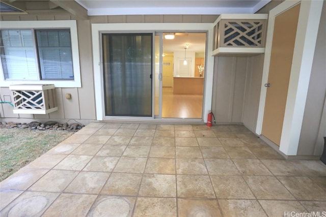 doorway to property featuring a patio