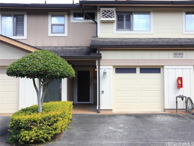 view of front of property with a garage