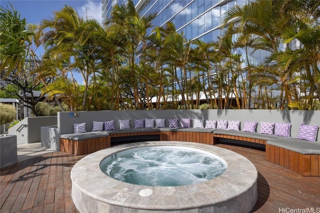 888 Kapiolani Blvd Unit Ph4501, Honolulu, HI 96813 - exterior space with an outdoor hot tub, a wooden deck, and an outdoor hangout area