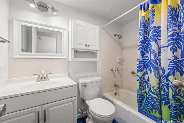 full bathroom featuring vanity, shower / bath combination with curtain, and toilet