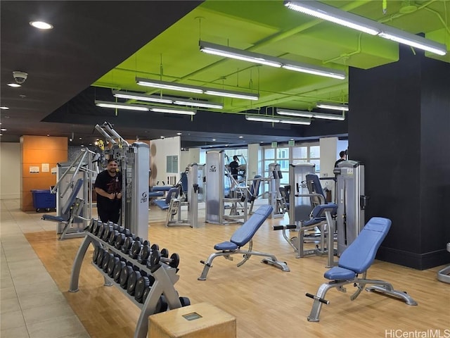 gym featuring light wood-type flooring