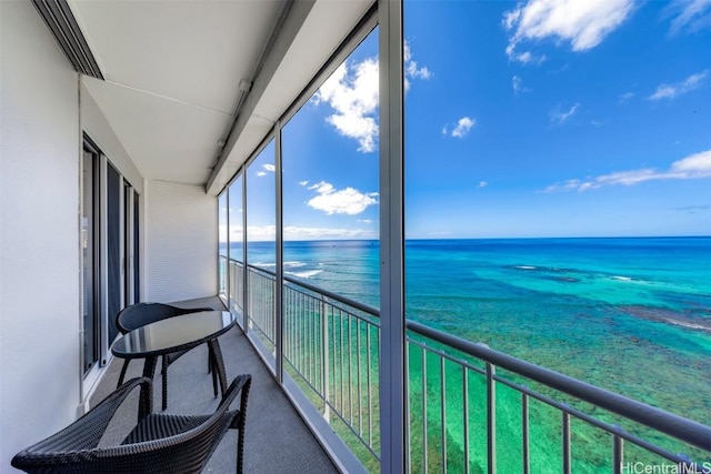 sunroom with a water view