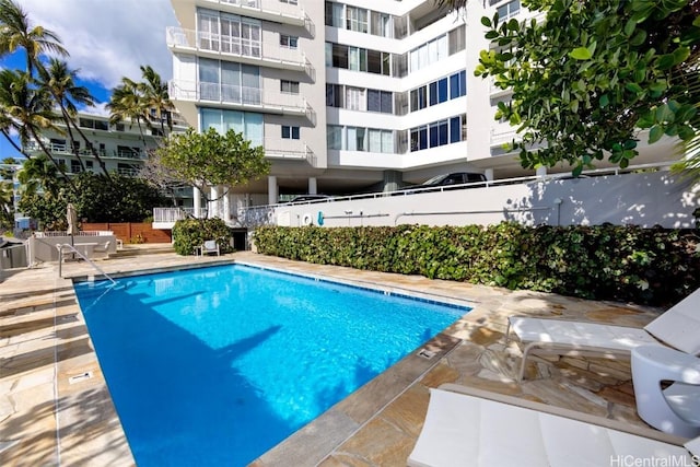 view of swimming pool featuring a patio