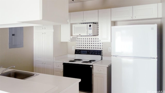 kitchen with white cabinets, sink, electric panel, and white appliances