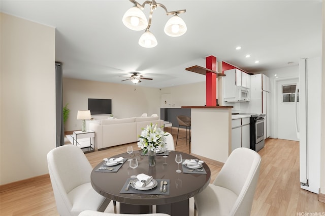 46-010 Aliikane Pl Unit 212, Kaneohe, HI 96744 - dining space featuring a chandelier, a ceiling fan, light wood finished floors, and recessed lighting