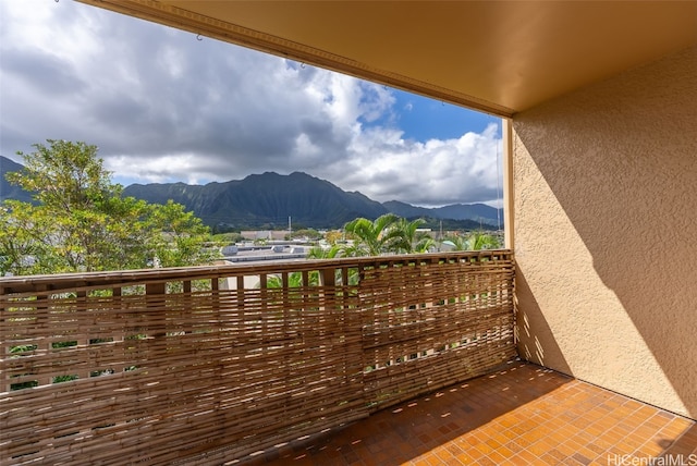 balcony featuring a mountain view