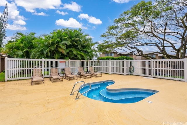 view of swimming pool featuring a patio