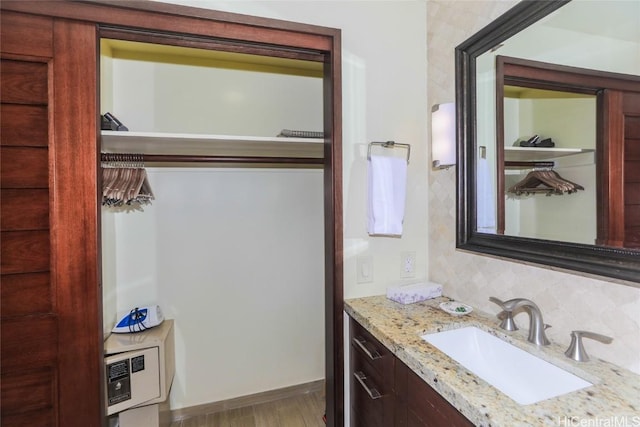 bathroom featuring vanity and hardwood / wood-style flooring