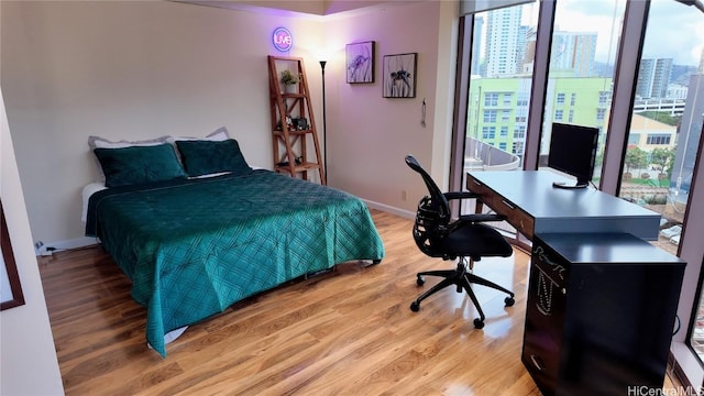 bedroom with light hardwood / wood-style flooring