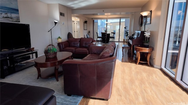 living room featuring light wood-type flooring