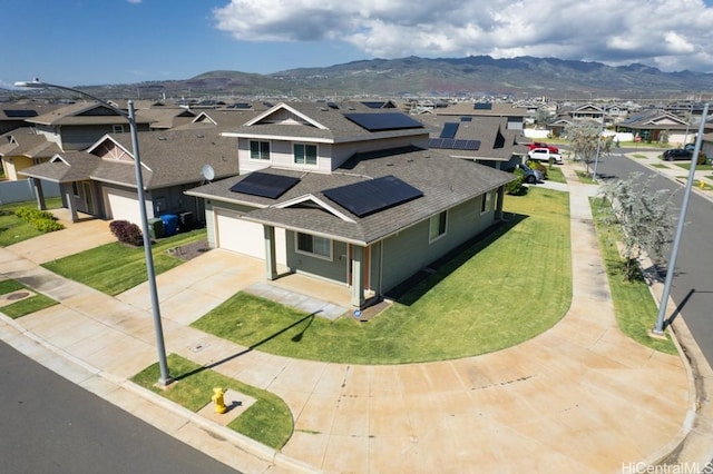 bird's eye view featuring a mountain view and a residential view