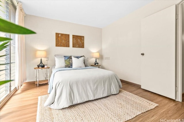 bedroom featuring light wood finished floors