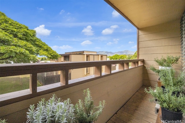 balcony featuring a mountain view