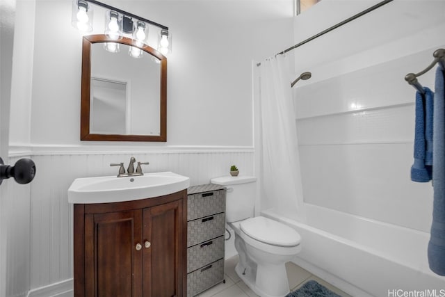 full bathroom with vanity, toilet, tile patterned flooring, and shower / bath combo