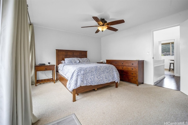 bedroom with ceiling fan and carpet flooring