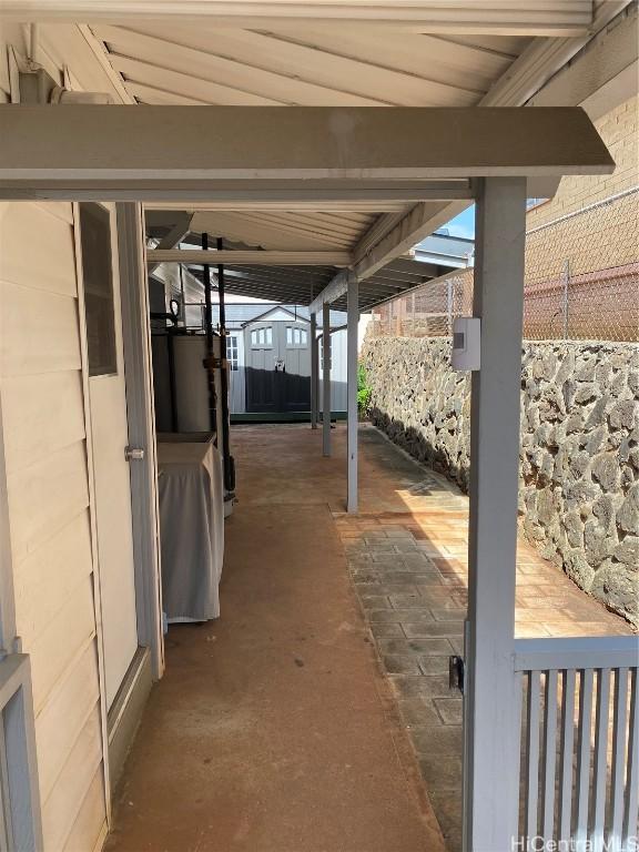 view of patio with water heater