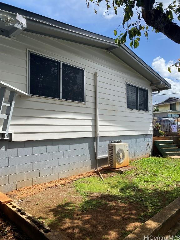 view of home's exterior with ac unit