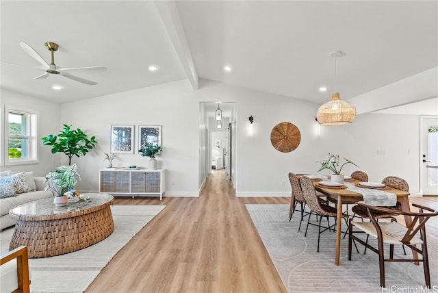 dining area featuring recessed lighting, lofted ceiling with beams, a ceiling fan, light wood-type flooring, and baseboards