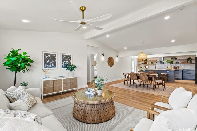 living room with lofted ceiling with beams, light wood-style floors, a ceiling fan, and recessed lighting