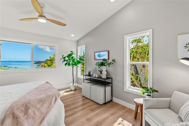 bedroom featuring lofted ceiling, ceiling fan, light wood-style flooring, recessed lighting, and baseboards