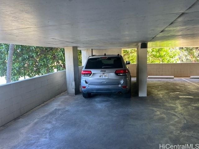 view of car parking featuring a carport