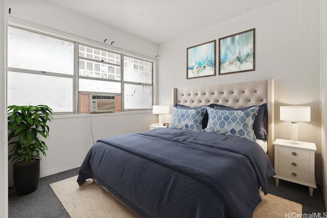 bedroom featuring carpet flooring and cooling unit