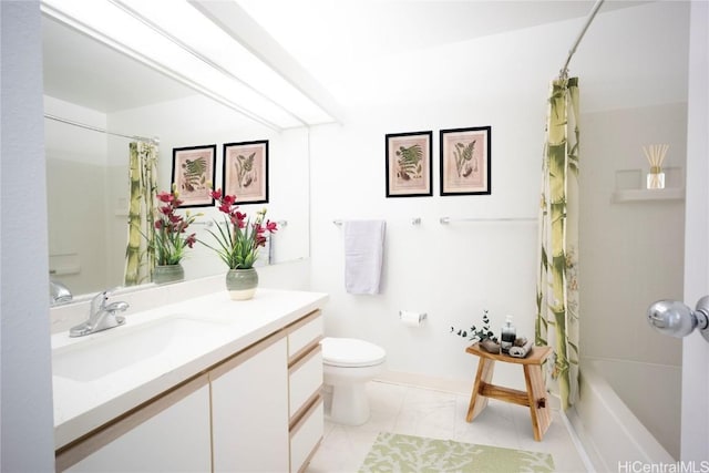 full bathroom featuring tile patterned floors, vanity, toilet, and shower / bath combo with shower curtain