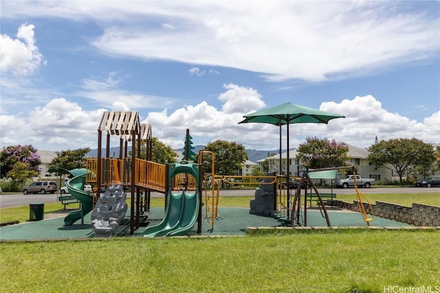 view of playground with a yard