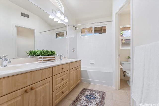 full bathroom featuring toilet, tile patterned flooring, visible vents, and a sink