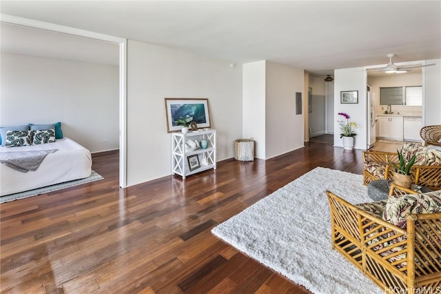 living room featuring dark wood-type flooring