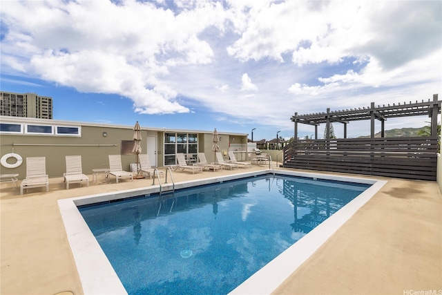 1020 Aoloa Pl Unit 109B, Kailua, HI 96734 - community pool with a pergola, fence, and a patio area