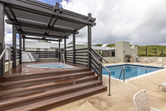 1020 Aoloa Pl Unit 109B, Kailua, HI 96734 - community pool featuring a pergola, a community hot tub, and a patio area