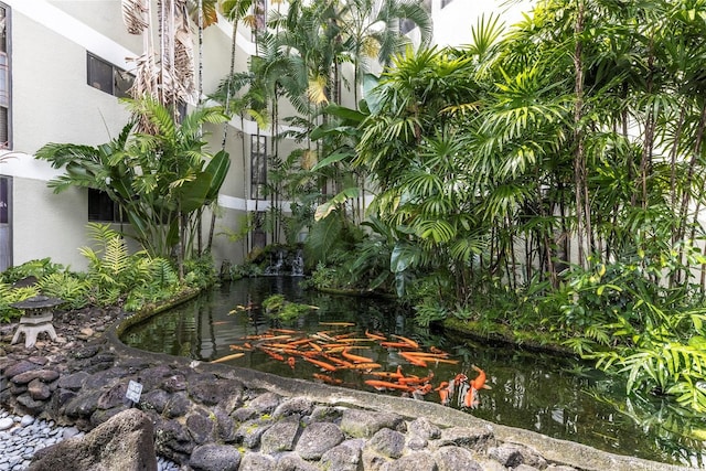1020 Aoloa Pl Unit 109B, Kailua, HI 96734 - view of yard with a small pond