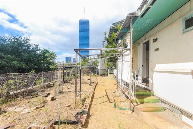 view of yard featuring fence