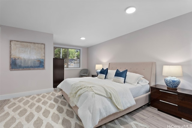 bedroom featuring light hardwood / wood-style floors