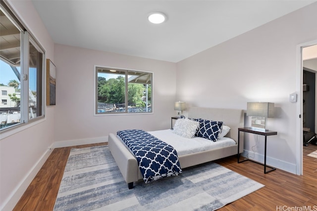 bedroom featuring wood-type flooring