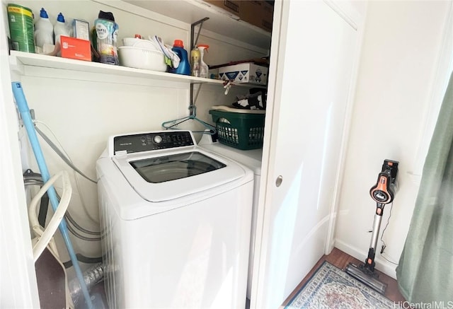 laundry room with washer / clothes dryer and hardwood / wood-style floors