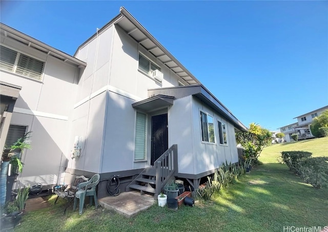 exterior space with a lawn