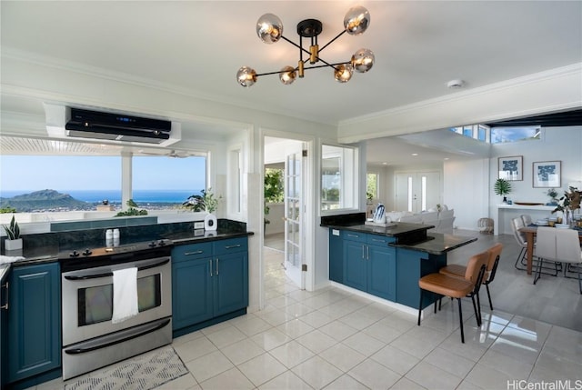 kitchen featuring crown molding, blue cabinets, stainless steel range oven, and extractor fan