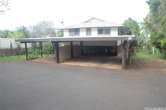 view of front facade featuring a carport