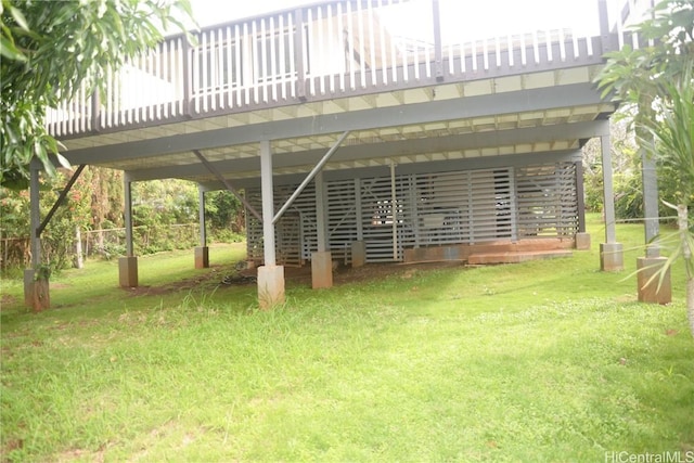 view of property's community with a yard and a deck