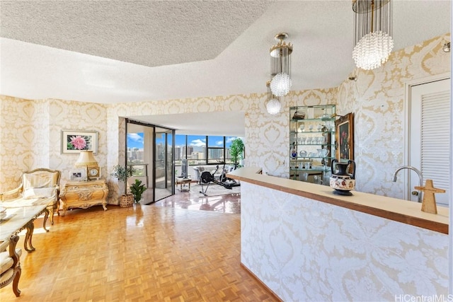 1221 Victoria St Unit 3201, Honolulu, HI 96814 - bar featuring a textured ceiling and wallpapered walls
