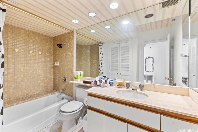 1221 Victoria St Unit 3201, Honolulu, HI 96814 - bathroom featuring toilet, recessed lighting, vanity, visible vents, and shower / bath combo with shower curtain