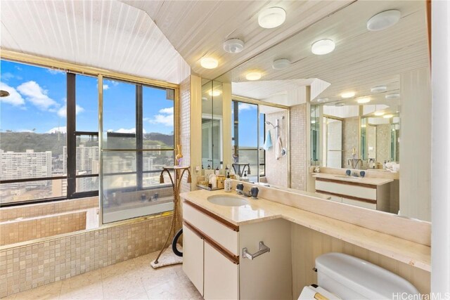 1221 Victoria St Unit 3201, Honolulu, HI 96814 - full bath featuring vanity, wooden ceiling, tile patterned flooring, and toilet