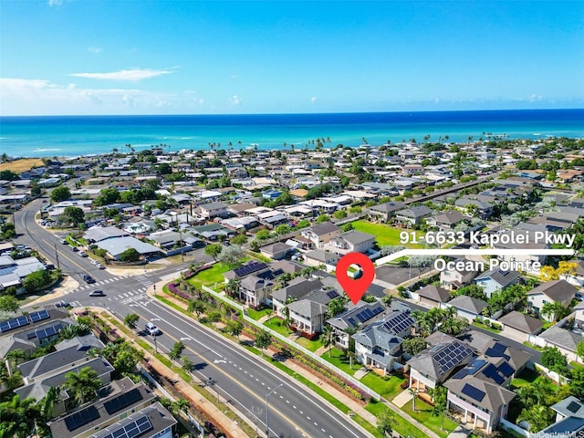 aerial view featuring a water view and a residential view