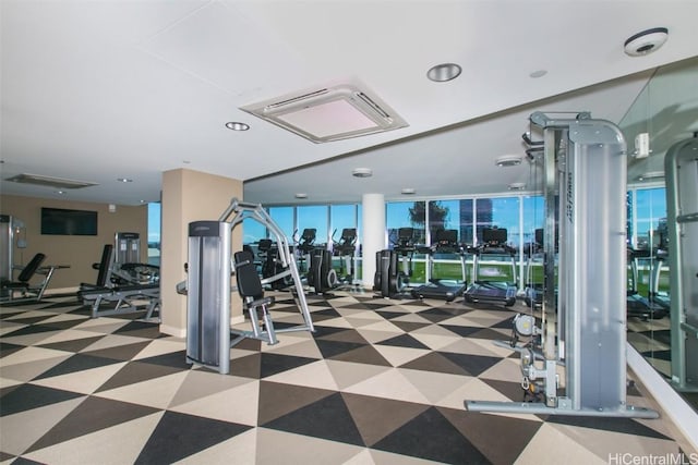 exercise room with a wall of windows