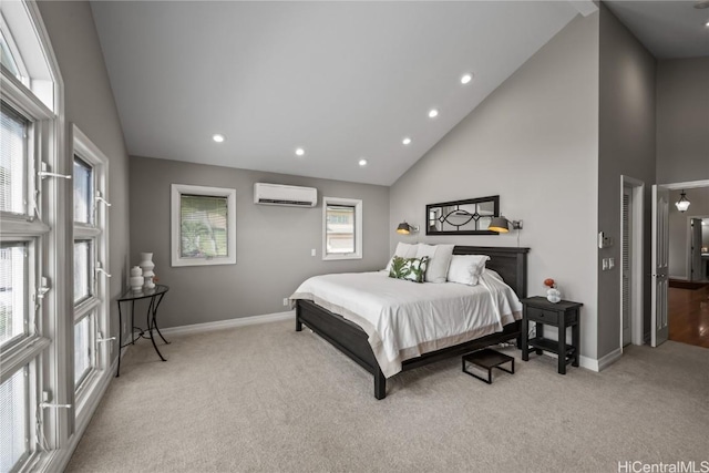 bedroom with a wall mounted AC, light carpet, and high vaulted ceiling